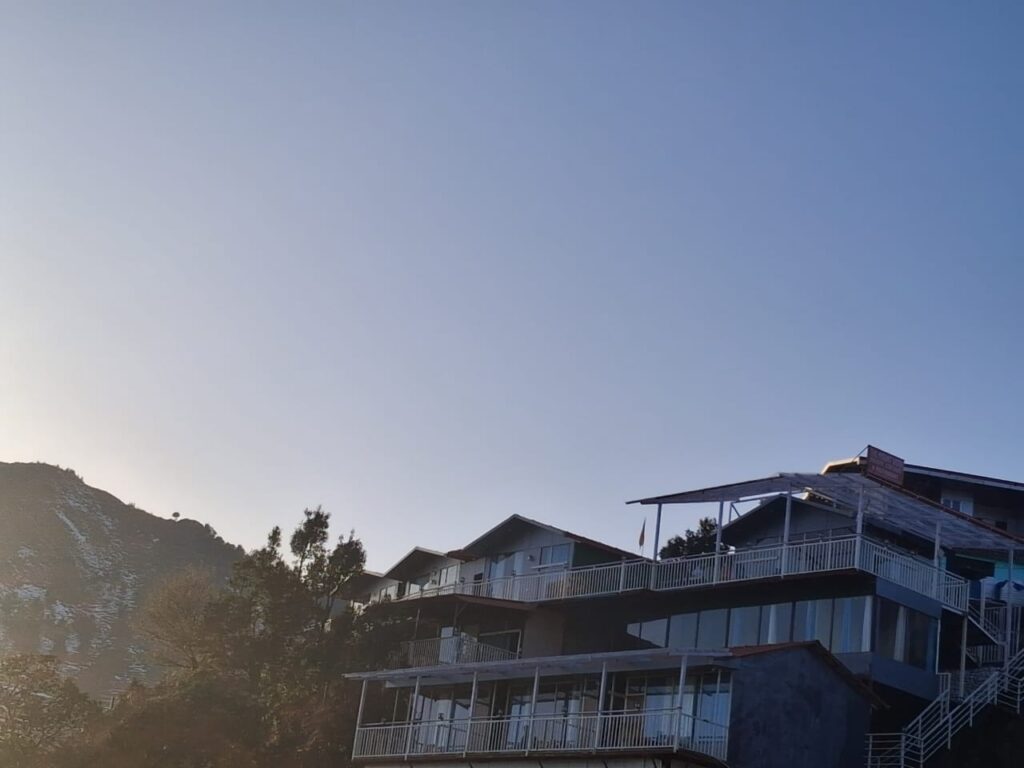 Resort view with hills in Dhanaulti daytime